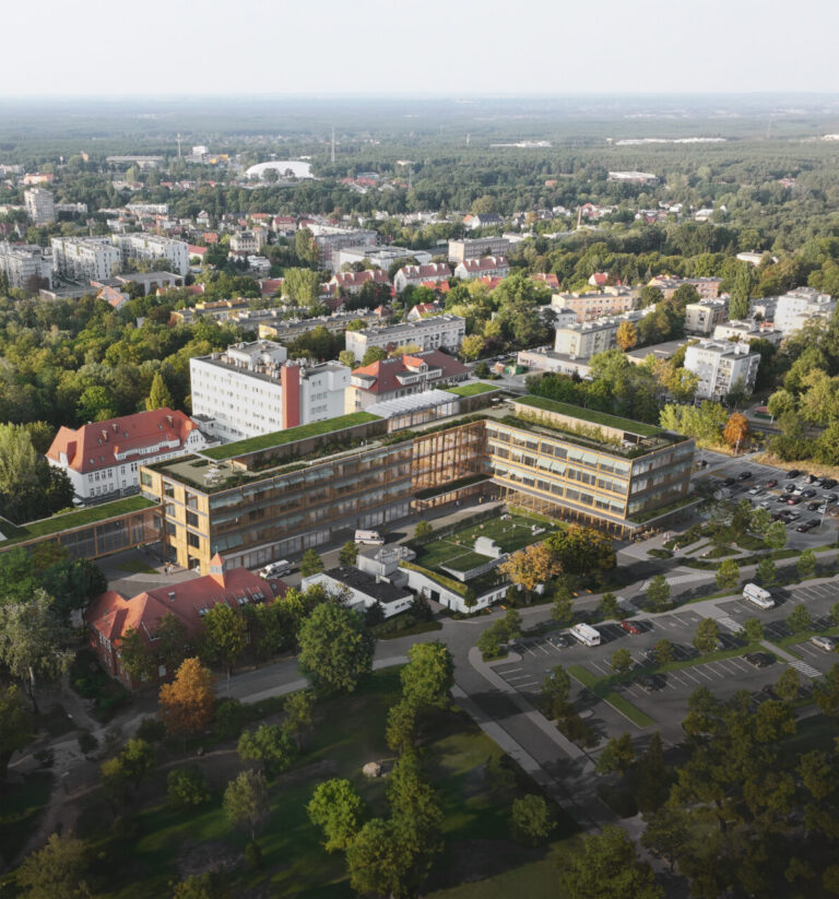 aerial photo of a medical centre in the city context